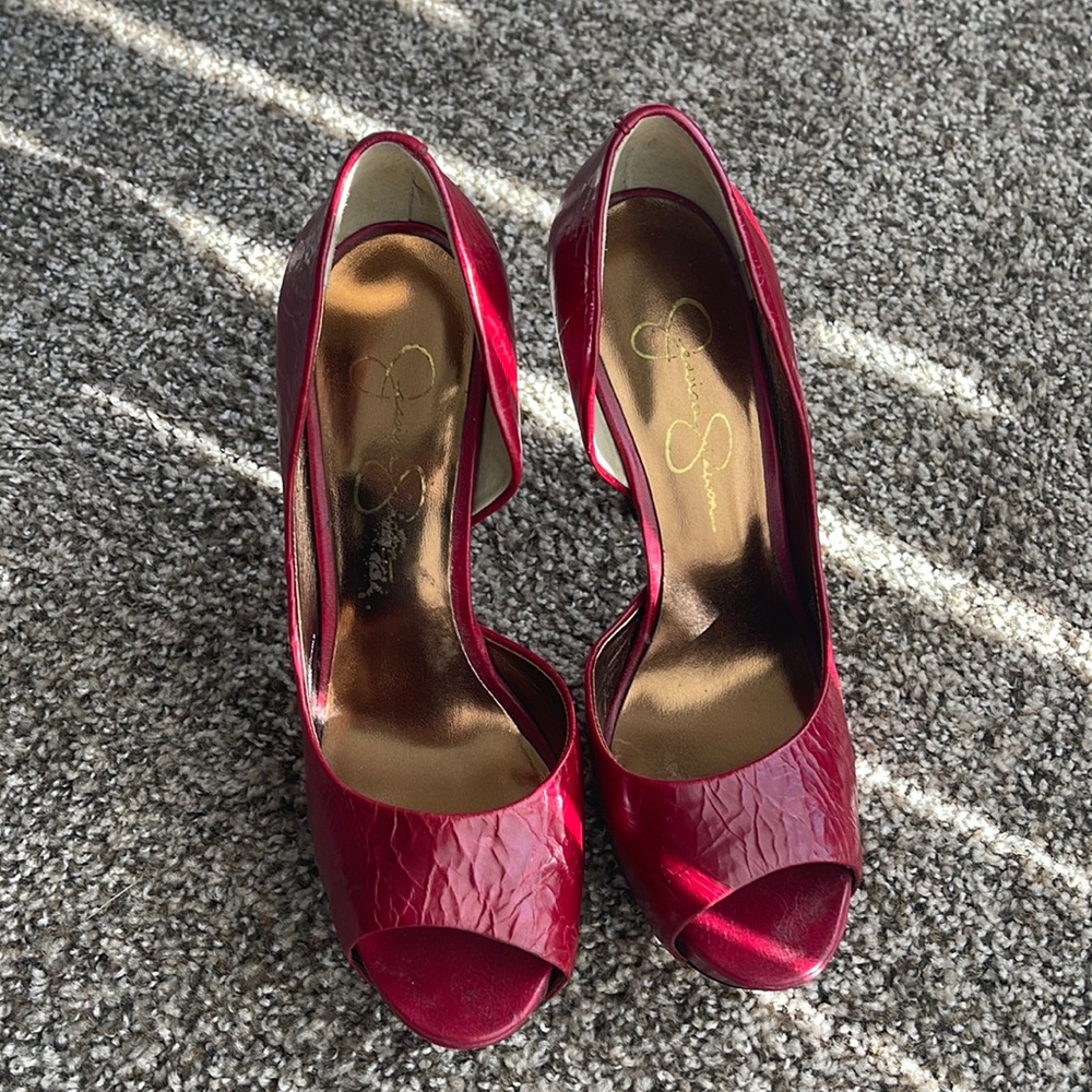 Lightly worn red peep toe heels